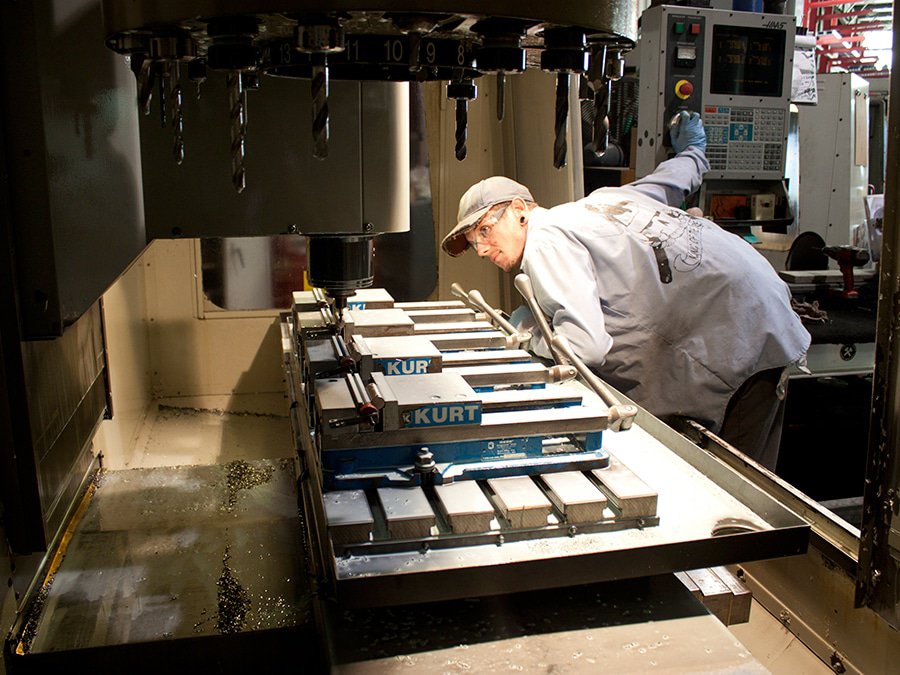 IMM Quality Boat Lifts engineer inspects boat lift parts for sale