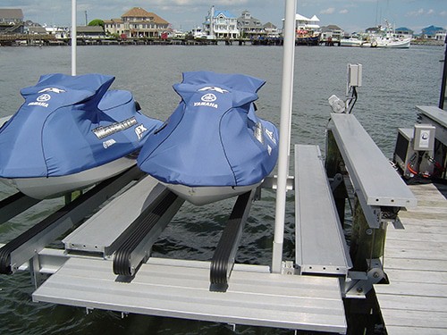 photo43 two blue jetskis sit on IMM Quality 4500 Dual PWC Jet Ski Lifts