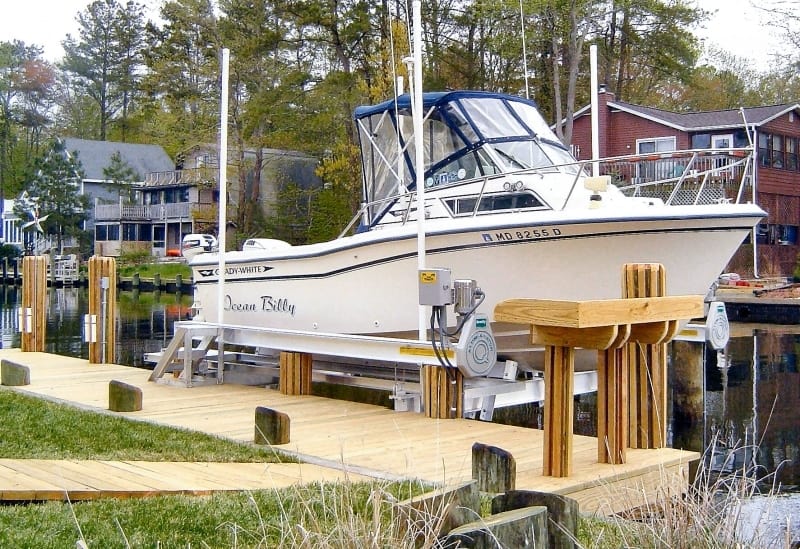 This IMM Quality Brindley 10K boat lift holds a white vessel called the Ocean Billy