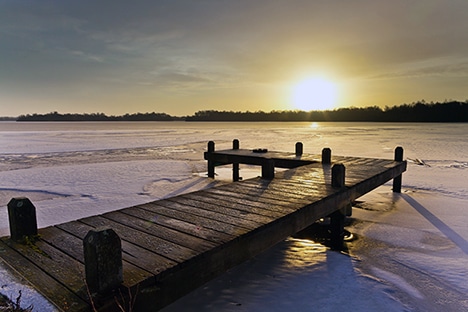 Boat Lift and Dock Winterization for long dock on frozen lake