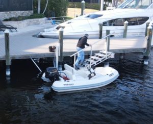 Man uses ascension stair boat lift to exit his boat