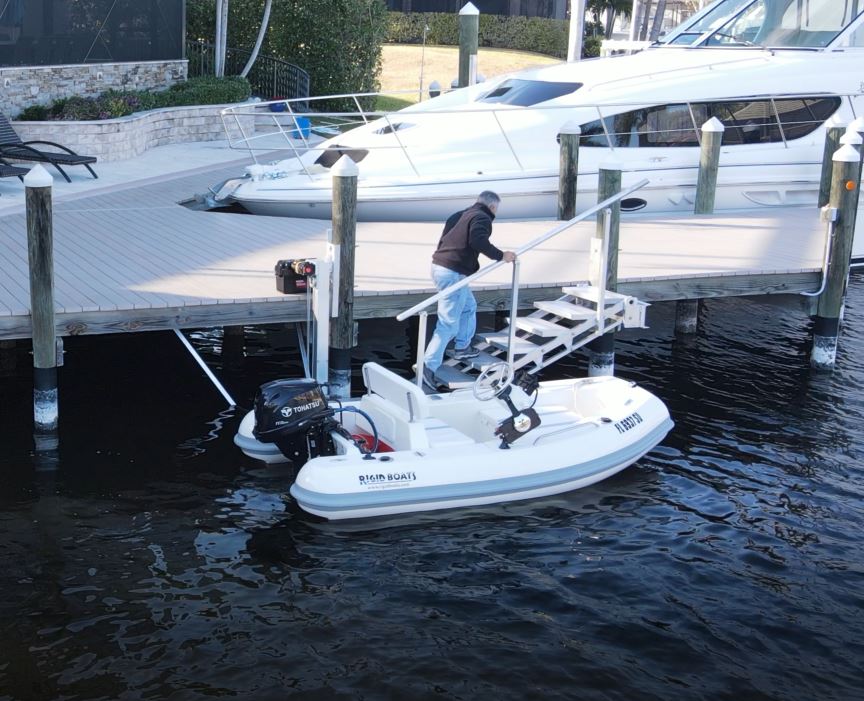12 Man uses ascension stair boat lift to exit his boat