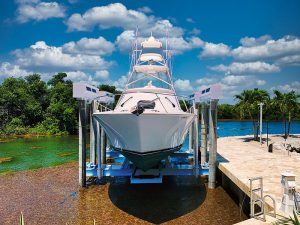 Front view of large boat stored in Titan yacht lift by IMM Quality Boat Lifts