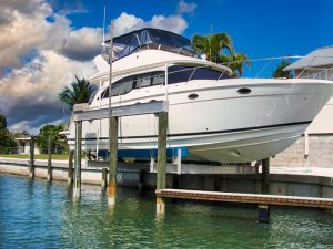 Superlift vertical boat lift in ocean city holds boat above water