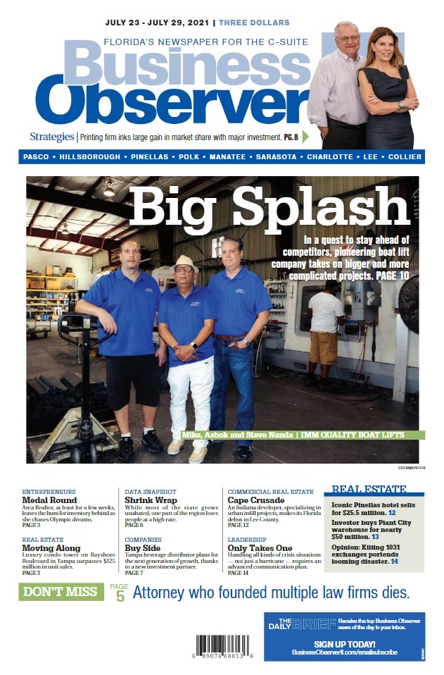 IMM Quality Boat Lifts Cover Feature in Business Observer showing Michael Ashok and Steve Nanda