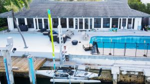 Kayak lift in front of neighborhood community pool requires minimal boat lift maintenance