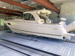 white intrepid boat on IMM Quality boat house lift