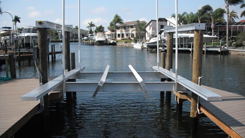 Hinged platforms for boat lift